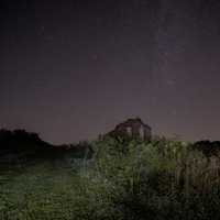 Galaxy over the Ruined House