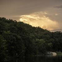 Orange dusk skies over the trees at Stewart Lake County Park