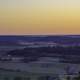 Red Skies landscape with farmland