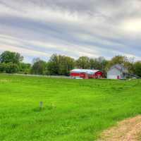 Farmhouse and barn in the landscape in Southern Wisconsin