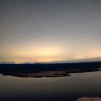 Stars above the river at night