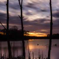 Sunset Millpond with moving clouds at Beckman Mill, Wisconsin