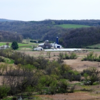 Valley landscape with farmhouse