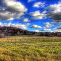 Fast moving clouds over fields