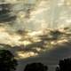 Dramatic Skies at sunset with clouds and sun rays