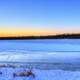 Across the icy river