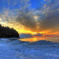 Bright sun rising at Whitefish Dunes State Park, Wisconsin