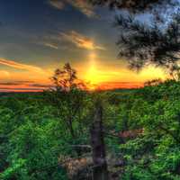 Sunset over the forest at Willow River State Park, Wisconsin