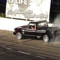 Black Chevy rallying around the track