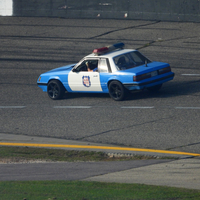 Blue and white slide patrol car