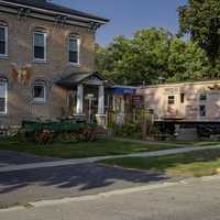 Hot dog stand next to residential building