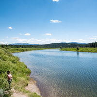 Woman standing by the river