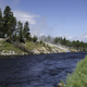 Beautiful river landscape with steam from the Geyser