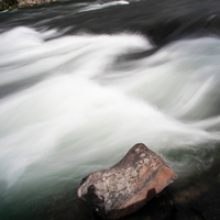 Close up of smooth flowing water of rapids