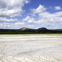 Geyser Plains with sky and clouds with trees