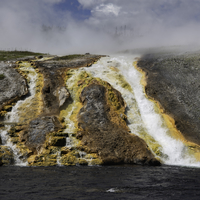 Steaming hot water flowing down from the springs