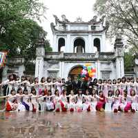 Group of people posing at the Temple of Literature in Hanoi, Vietnam