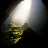 Light shining through on a cave in Vietnam