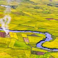River flowing through farmland in Vietnam