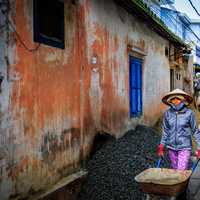 Vietnamese Workers in Hoi An, Vietnam