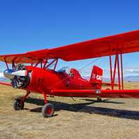 Red Bi-plane Grumman Ag-Cat plane