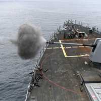 Battleship firing Large Guns